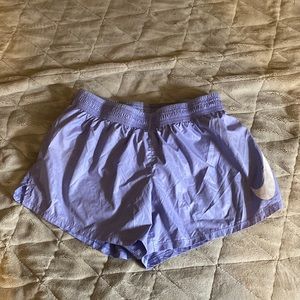 Bright purple Nike running shorts Medium